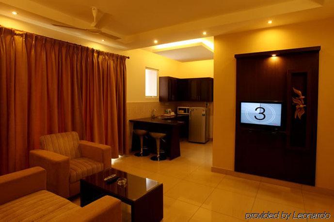 Hotel Nagarjuna Suites Бенґалуру Номер фото